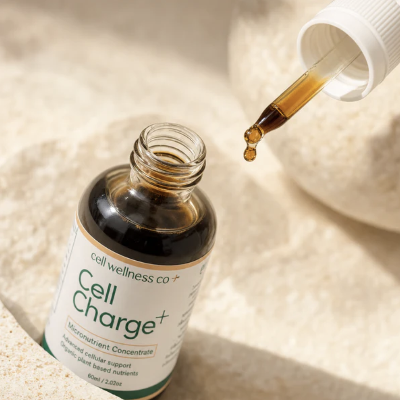 Cell Charge+ dropper releasing a drop of concentrate